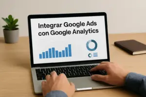 Persona usando un portátil para integrar Google Ads con Google Analytics 4, con gráficos en pantalla sobre rendimiento de campañas