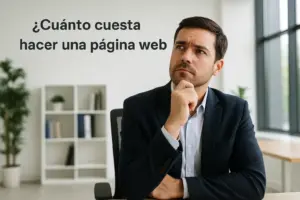 Empresario en oficina moderna pensando en cuánto cuesta hacer una página web, con luz natural y ambiente limpio y profesional.